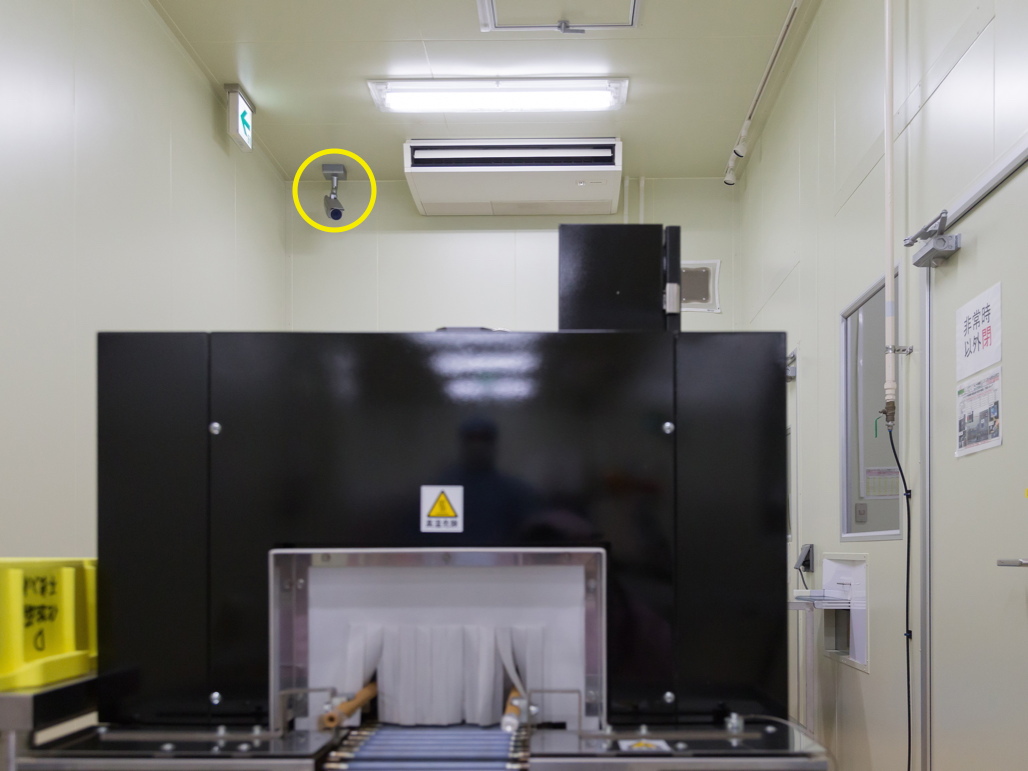 写真：製品梱包装置の稼働状況をモニタリング